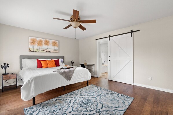 MainFloor-Master Bedroom: King bed w premium mattress. Barn-door to En-Suite.
