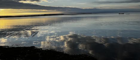 sunrise from your private beach outside the cottage