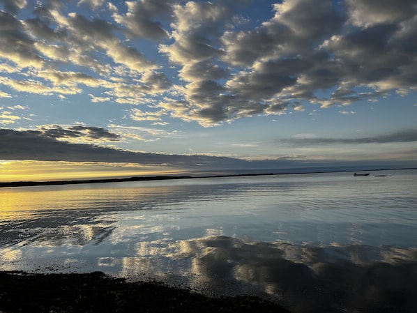 sunrise from your private beach outside the cottage