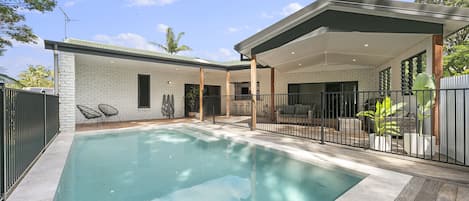 Pool and Outdoor Alfresco with dining table, Webber BBQ, Bar Fridge and Couches