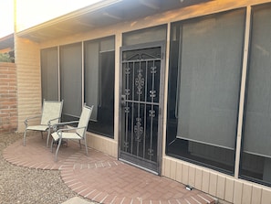 Rear patio facing the screened in porch