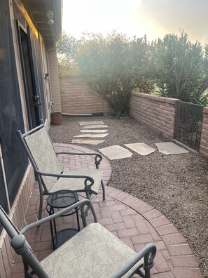 Back patio with chairs.  A quiet spot for your morning coffee