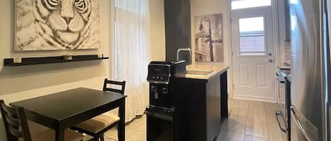 Fully Equipped Kitchen with water filtration system. Access to balcony.