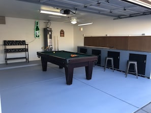 Pool table in garage for extra entertainment 