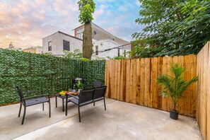 Private back patio with grill 