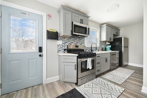 Kitchen #1 - Back door leading to rear private parking