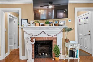 This home has fiber optic internet from At&t. We deliberately choose not to provide cable in any of our homes. The front hallway is to the right of the photo and has the front door and Ivy's room access.