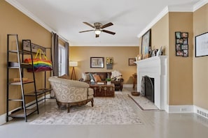 The front door is on the far right and the dining room and kitchen are through the arched doorway in the center. The piano was tuned last year and you are welcome to play it to your heart's content.