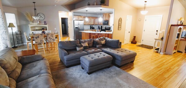 Living room with sectional sofa and reclining loveseat