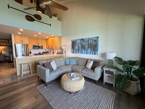 Comfortable living room with all new furniture and art in 2024.