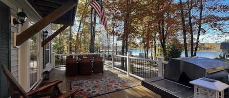 Furnished, composite deck that spans the front of the home on the main level