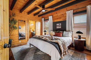 King-size bed with Plush bedding + Ensuite bathroom!  (Upstairs bedroom)