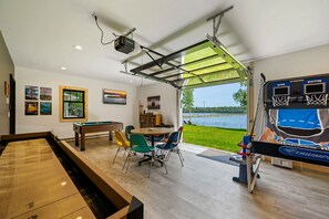 Our lakeside game room has shuffleboard, pop-a-shot, bumper pool and plenty of board games for everyone!
