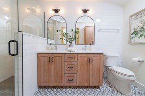 The stunning ensuite bath has a double vanity.