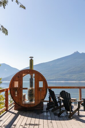 Take in the views from private wood fired sauna and deck overlooking the lake