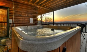 Relax in the hot tub with breathtaking views and peaceful surroundings.