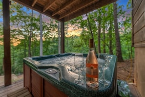 View from workstation door/lower level of hot tub and dusk view