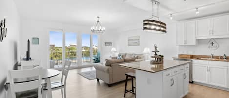 Dining, Kitchen and Living Areas with Lake View