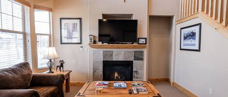 Living Room with a Gas Fireplace and Smart TV with Directv