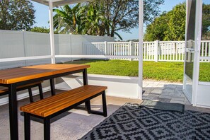 Covered lanai patio with fenced backyard for family fun!