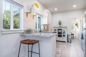 Kitchen is the heart of our home. Stocked up with essentials for cooking.