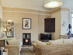Delightful living room with wood burner | Neuadd, Menai Bridge, near Bangor