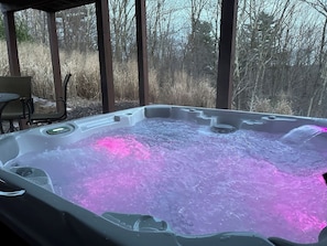 Downstairs Patio • 7 Person Hot Tub • 4 Person Patio Table • Mountain Views