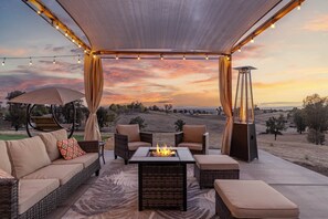 Huge patio with table for 12 and outdoor furniture for 10