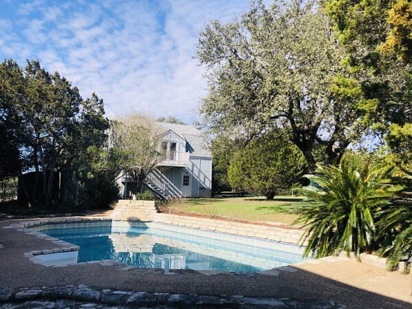 Pool with blue barn in the background