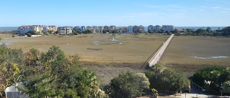 Ocean view showing the short boardwalk to the beach. An easy, 7-minute walk