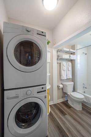 Bathroom w/ full sized washer and dryer!