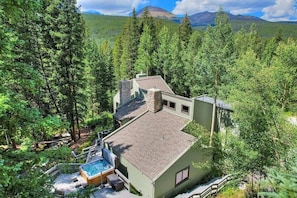 Colorado living an unparalleled location. Merging easy access to Summit County's attractions with the tranquility of nature, this home offers a truly exclusive retreat.