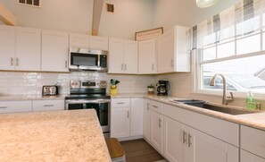 Bright, large kitchen, fully equipped.