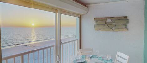 Private extra-spacious beachfront balcony with dining table, bar stools, and the perfect environment to relax!