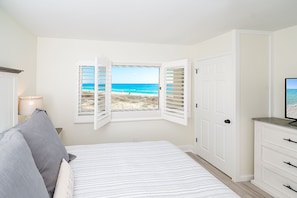 Enjoy the amazing view from the king bed in the master bedroom