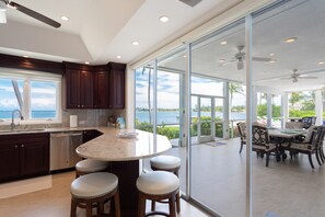 Kitchen with breakfast bar seating.