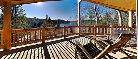 Find your happy place on our covered deck with lake views