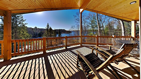 Find your happy place on our covered deck with lake views