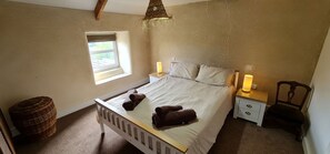 Master bedroom with kingsize bed