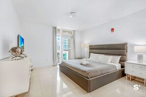 Bedroom 1 features a king size bed and Smart Tv