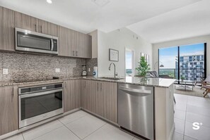 Kitchen features stainless steel appliances