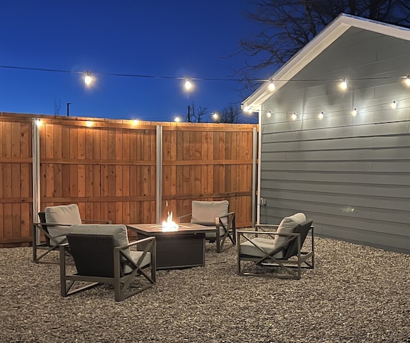 Large firepit area with comfortable rocking chairs to enjoy crisp CO nights.