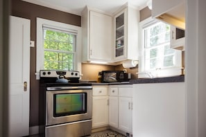 Clean kitchen with lots of natural light.