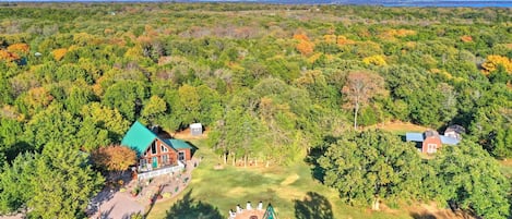 15 acres of wildlife and woods with a creek make this ranch a perfect getaway. 