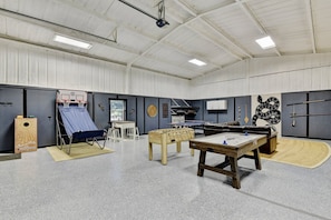 1,000 sq ft game room with ping pong, foosball, air hockey, and more!