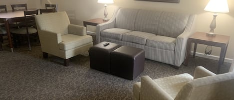 Your spacious living room has a pull out couch, TV and electric fireplace