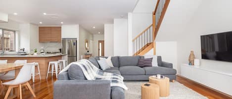 Open plan downstairs living, dining and kitchen area