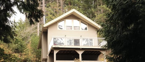 Our home nestled in the woods, minutes to the beach