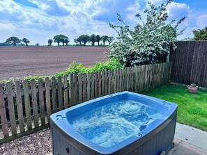 Private hot tub with south facing field views
