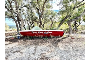 A boat to welcome you to Don't Rock the Boat filled with seasonal flowers.